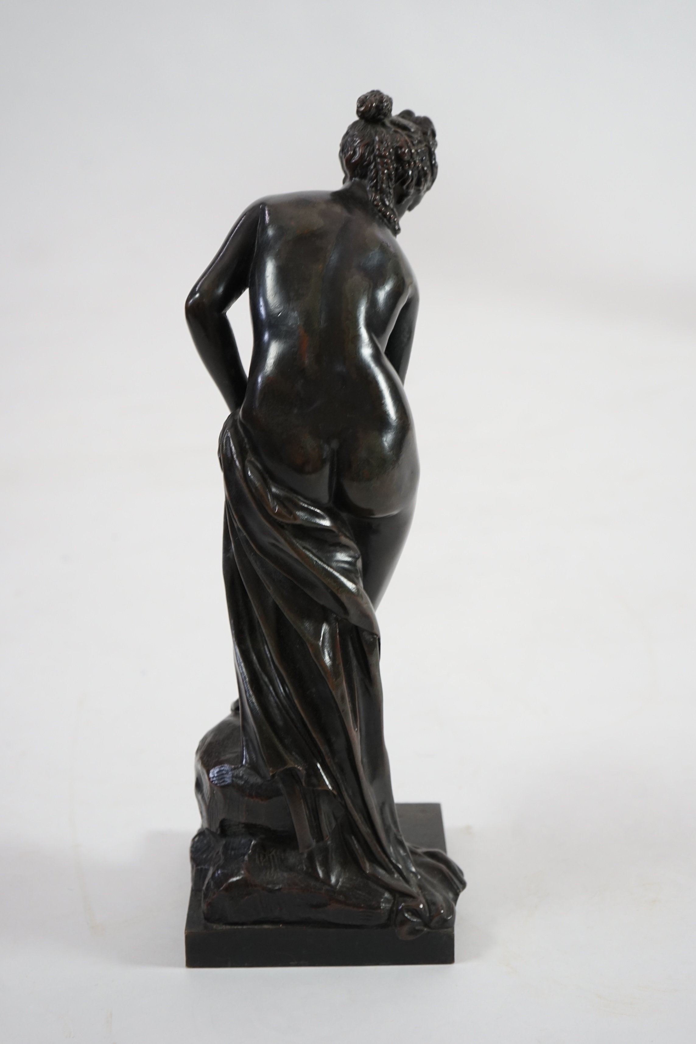 After Christophe-Gabriel Allegrain (1710-1795), a late 19th century bronze model of Venus sortant du bain